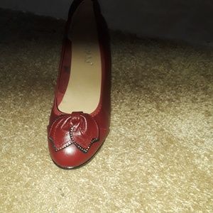 Brand new red  leather bow knot shoes.